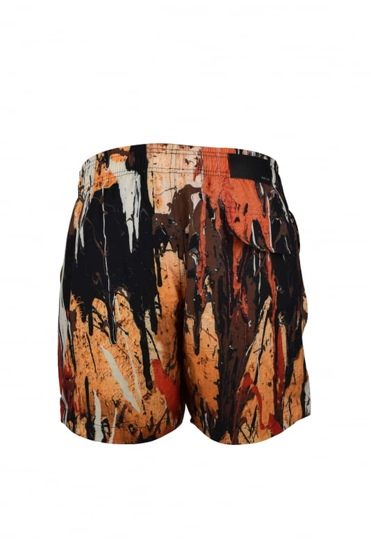 Bañador Amiri de poliéster.Estampados efecto mancha de pintura.Estampados en amarillo, marrón, rojo, blanco y negro.Bolsillos con aberturas laterales.Bolsillo trasero.Placa negra con logotipo en la espalda.Cintura elástica.Cordón de ajuste blanco.Logotipo blanco en el bajo.