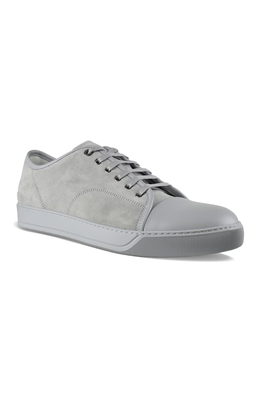 Sneakers Lanvin DBB1 en ante gris.Bordes de cuero gris.Puntera redondeada de cuero gris.Suela de caucho tono sobre tono.Cierre de cordones gris.Made in Italy.