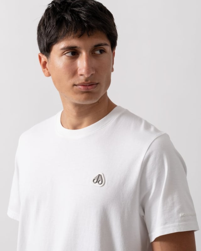 This t-shirt keeps it minimal with tiny branding at the front, offering a clean and understated look.


Regular Fit
Rib Knit Collar
Triangle Patch with Gun Metal Logo
Moose Knuckles Label on Side Seam



100% Pima Cotton Jersey
M15MT777