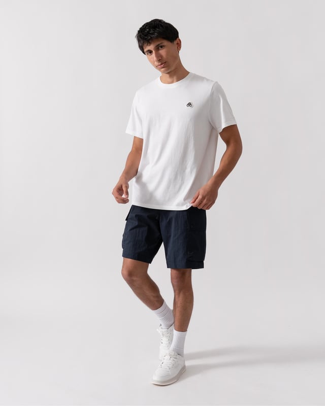 This t-shirt keeps it minimal with tiny branding at the front, offering a clean and understated look.


Regular Fit
Rib Knit Collar
Triangle Patch with Gun Metal Logo
Moose Knuckles Label on Side Seam



100% Pima Cotton Jersey
M15MT777