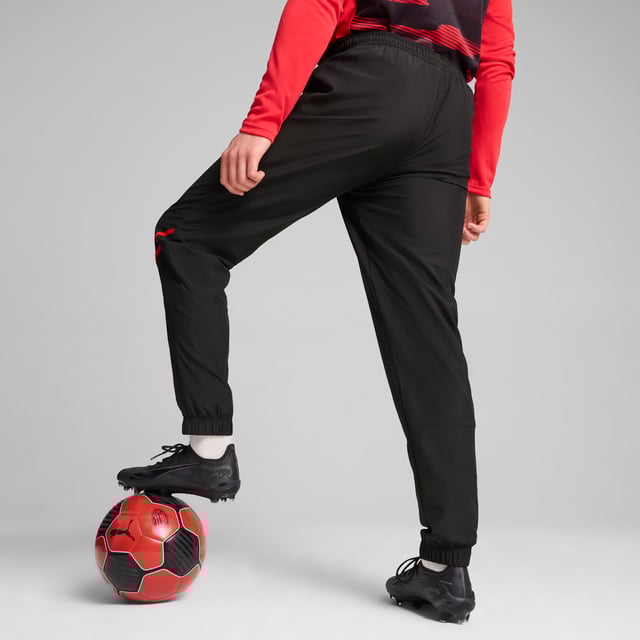 PRODUCT STORY: Show your Rossoneri pride with these official AC Milan pre-match woven pants. Constructed for comfort, these slim-fitting pants move with you while dryCELL tech wicks sweat and keeps you comfortable. Zipped pockets keep essentials secure as you focus on the match ahead. Forza Milan! FEATURES & BENEFITS: dryCELL: Performance technology designed to wick moisture from the body and keepyou free of sweat during exercise; Made with at least 50% recycled materials. DETAILS: Slim fit; 80 gsm, Plain weave; Medium rise; Zipped pockets; Official team branding.  Our model is 185 cm tall and is wearing size M UK.