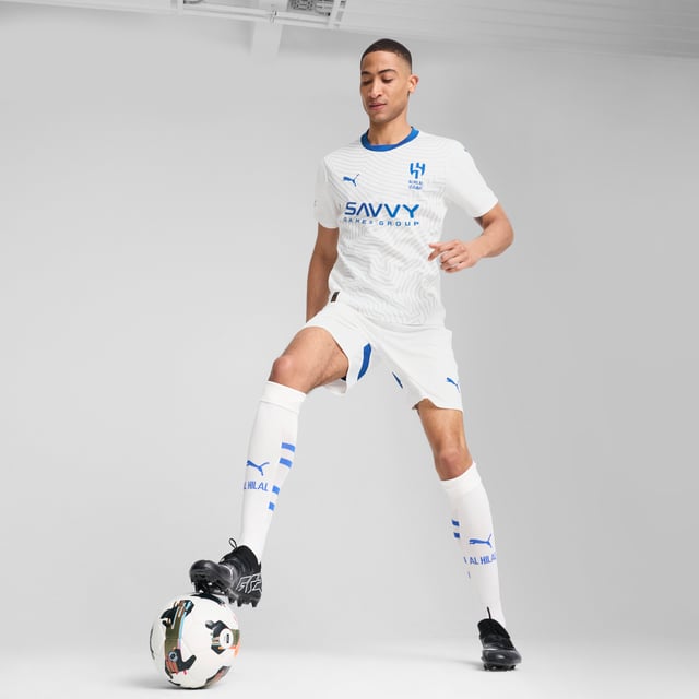 PRODUCT STORY: This official 24/25 Away Kit honours Al Hilal Saudi F.C. With a desert landscape graphic, reflecting the city of Riyadh. The club's badge stands proudly on the chest, while our moisture-wicking dryCELL fabric keeps you cool and dry.FEATURES &amp; BENEFITS: dryCELL: Performance technology designed to wick moisture from the body and keep you free of sweat during exercise; Made with 100% recycled material excluding trims &amp; decorations. DETAILS: Regular fit; 170 gsm, Jacquard; Crew neck; Short sleeves; Official team branding; 100% Recycled Polyester.