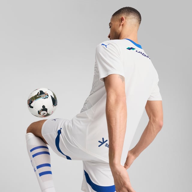 PRODUCT STORY: This official 24/25 Away Kit honours Al Hilal Saudi F.C. With a desert landscape graphic, reflecting the city of Riyadh. The club's badge stands proudly on the chest, while our moisture-wicking dryCELL fabric keeps you cool and dry.FEATURES &amp; BENEFITS: dryCELL: Performance technology designed to wick moisture from the body and keep you free of sweat during exercise; Made with 100% recycled material excluding trims &amp; decorations. DETAILS: Regular fit; 170 gsm, Jacquard; Crew neck; Short sleeves; Official team branding; 100% Recycled Polyester.