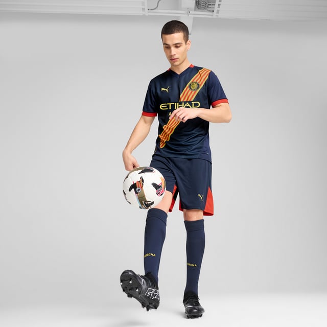 PRODUCT STORY: Gear up and show your allegiance to Girona FC with the official 24/25 Away Jersey. It features mesh panels and moisture-wicking dryCELL tech to keep you feeling cool and comfortable. FEATURES & BENEFITS: dryCELL: Performance technology designed to wick moisture from the body and keep you free of sweat during exercise; As part of the RE:FIBRE program, this garment is made of at least 95% recycled material from textile waste and other used materials. DETAILS: Regular fit; 170 gsm, Jacquard; Mesh inserts; V-neck; Short sleeves; Official team branding.  Our model is 183 cm tall and is wearing size M UK.