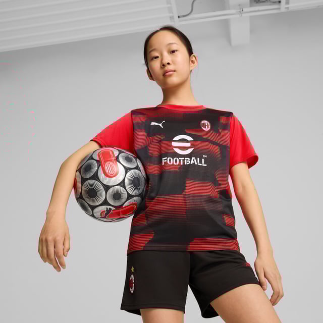 PRODUCT STORY: Feel like one of the team in this official AC Milan pre-match jersey. dryCELL tech wicks away sweat while the iconic Rossoneri crest on the chest lets you represent the team with pride. Forza Milan! FEATURES & BENEFITS: dryCELL: Performance technology designed to wick moisture from the body and keep you free of sweat during exercise; Made with 100% recycled material excluding trims & decorations. DETAILS: Regular fit; 145 gsm, Jersey; Crew neck; Short sleeves; Official team branding; PUMA Youth: Recommended for older kids between 8 and 16 years.