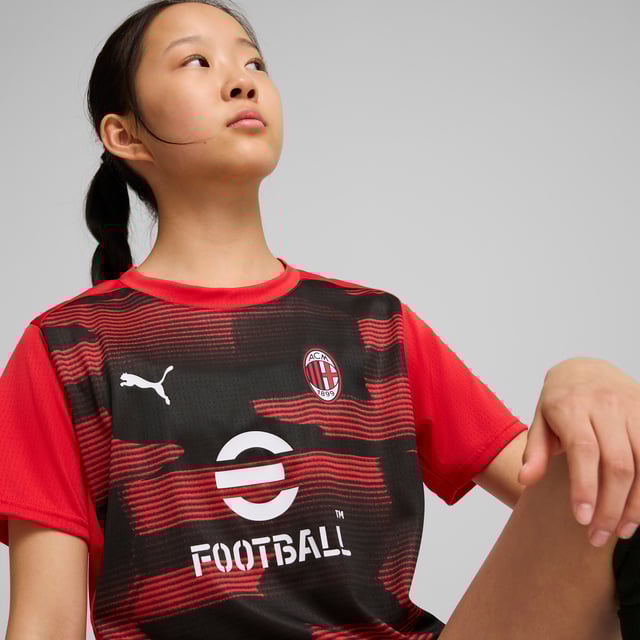 PRODUCT STORY: Feel like one of the team in this official AC Milan pre-match jersey. dryCELL tech wicks away sweat while the iconic Rossoneri crest on the chest lets you represent the team with pride. Forza Milan! FEATURES & BENEFITS: dryCELL: Performance technology designed to wick moisture from the body and keep you free of sweat during exercise; Made with 100% recycled material excluding trims & decorations. DETAILS: Regular fit; 145 gsm, Jersey; Crew neck; Short sleeves; Official team branding; PUMA Youth: Recommended for older kids between 8 and 16 years.