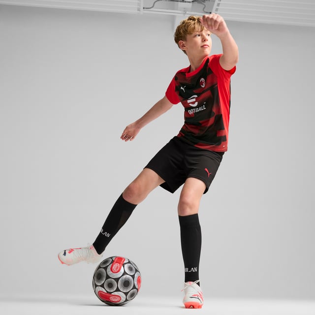 PRODUCT STORY: Feel like one of the team in this official AC Milan pre-match jersey. dryCELL tech wicks away sweat while the iconic Rossoneri crest on the chest lets you represent the team with pride. Forza Milan! FEATURES & BENEFITS: dryCELL: Performance technology designed to wick moisture from the body and keep you free of sweat during exercise; Made with 100% recycled material excluding trims & decorations. DETAILS: Regular fit; 145 gsm, Jersey; Crew neck; Short sleeves; Official team branding; PUMA Youth: Recommended for older kids between 8 and 16 years.
