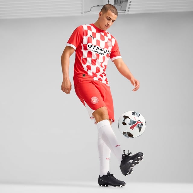 PRODUCT STORY: Gear up and show your allegiance to Girona FC with the official 24/25 Home Jersey. It features mesh panels and moisture-wicking dryCELL tech to keep you feeling cool and comfortable. FEATURES & BENEFITS: dryCELL: Performance technology designed to wick moisture from the body and keep you free of sweat during exercise; As part of the RE:FIBRE program, this garment is made of at least 95% recycled material from textile waste and other used materials. DETAILS: Regular fit; 170 gsm, Jacquard; Mesh inserts; Crew neck; Short sleeves; Official team branding.  Our model is 189 cm tall and is wearing size M UK.