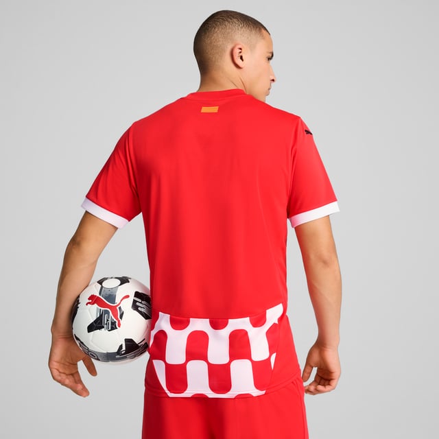 PRODUCT STORY: Gear up and show your allegiance to Girona FC with the official 24/25 Home Jersey. It features mesh panels and moisture-wicking dryCELL tech to keep you feeling cool and comfortable. FEATURES & BENEFITS: dryCELL: Performance technology designed to wick moisture from the body and keep you free of sweat during exercise; As part of the RE:FIBRE program, this garment is made of at least 95% recycled material from textile waste and other used materials. DETAILS: Regular fit; 170 gsm, Jacquard; Mesh inserts; Crew neck; Short sleeves; Official team branding.  Our model is 189 cm tall and is wearing size M UK.