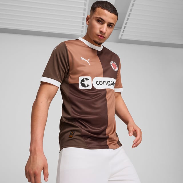 PRODUCT STORY: Gear up and show your allegiance to FC St. Pauli with the 24/25 Home Jersey. It features mesh inserts and moisture-wicking dryCELL tech to keep you feeling cool and comfortable. FEATURES & BENEFITS: dryCELL: Performance technology designed to wick moisture from the body and keep you free of sweat during exercise; As part of the RE:FIBRE program, this garment is made of at least 95% recycled material from textile waste and other used materials. DETAILS: Regular fit; 170 gsm, Jacquard; Mesh inserts; Crew neck; Short sleeves; Official team branding; 100% Recycled Polyester.  Our model is 189 cm tall and is wearing size M UK.