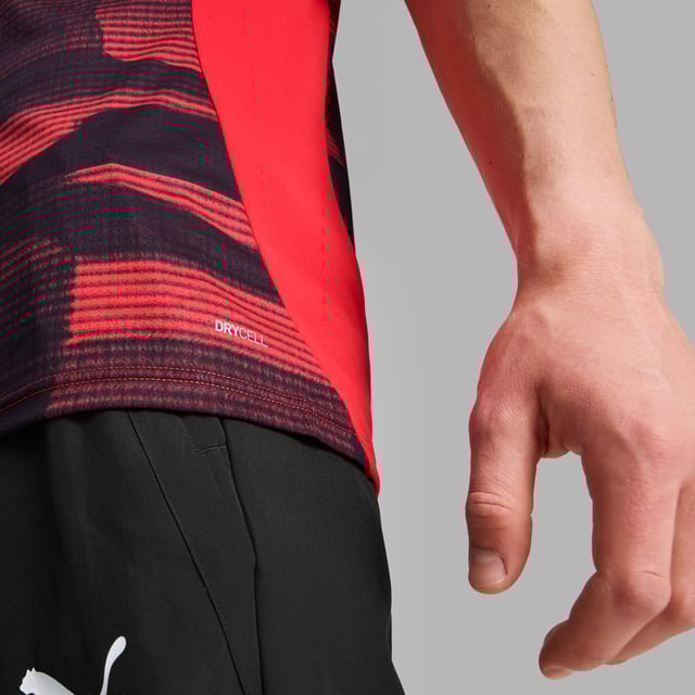PRODUCT STORY: Feel like one of the team in this official AC Milan pre-match jersey. dryCELL tech wicks away sweat while the iconic Rossoneri crest on the chest lets you represent the team with pride. Forza Milan! FEATURES & BENEFITS: dryCELL: Performance technology designed to wick moisture from the body and keepyou free of sweat during exercise; Made with 100% recycled material excluding trims & decorations. DETAILS: Slim fit; 145 gsm, Jersey; Crew neck; Short sleeves; Official team branding.  Our model is 185 cm tall and is wearing size M UK.