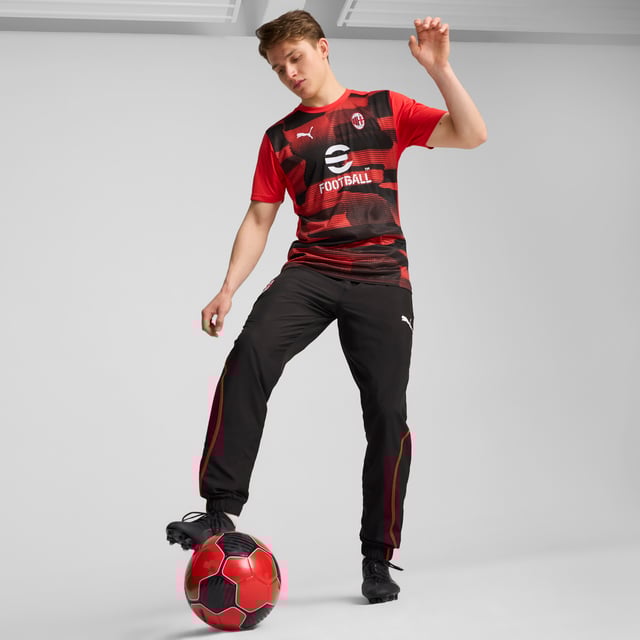 PRODUCT STORY: Feel like one of the team in this official AC Milan pre-match jersey. dryCELL tech wicks away sweat while the iconic Rossoneri crest on the chest lets you represent the team with pride. Forza Milan! FEATURES & BENEFITS: dryCELL: Performance technology designed to wick moisture from the body and keepyou free of sweat during exercise; Made with 100% recycled material excluding trims & decorations. DETAILS: Slim fit; 145 gsm, Jersey; Crew neck; Short sleeves; Official team branding.  Our model is 185 cm tall and is wearing size M UK.