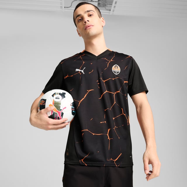 PRODUCT STORY: Show your support for the team with the official FC Shakhtar Donetsk 24/25 Away Jersey. Built for peak-performance, it features strategically placed mesh inserts for ventilation, alongside moisture-wicking dryCELL tech to keep you comfortable. FEATURES & BENEFITS: dryCELL: Performance technology designed to wick moisture from the body and keep you free of sweat during exercise; Made with 100% recycled material excluding trims & decorations. DETAILS: Regular fit; 170 gsm, Jacquard; Mesh inserts; V-neck; Short sleeves; Official team branding.  Our model is 183 cm tall and is wearing size M UK.