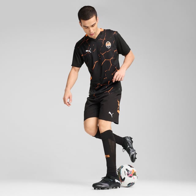 PRODUCT STORY: Show your support for the team with the official FC Shakhtar Donetsk 24/25 Away Jersey. Built for peak-performance, it features strategically placed mesh inserts for ventilation, alongside moisture-wicking dryCELL tech to keep you comfortable. FEATURES & BENEFITS: dryCELL: Performance technology designed to wick moisture from the body and keep you free of sweat during exercise; Made with 100% recycled material excluding trims & decorations. DETAILS: Regular fit; 170 gsm, Jacquard; Mesh inserts; V-neck; Short sleeves; Official team branding.  Our model is 183 cm tall and is wearing size M UK.