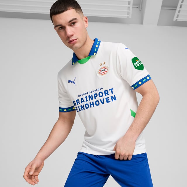 PRODUCT STORY: Many players have worn the PSV stripes with success. With this season's third kit we celebrate players from one country in particular: Brazil. Play like PSV's finest in this jersey featuring dryCELL tech and strategically placed mesh inserts to keep you cool and focused. FEATURES & BENEFITS: dryCELL: Performance technology designed to wick moisture from the body and keep you free of sweat during exercise; As part of the RE:FIBRE program, this garment is made of at least 95% recycled material from textile waste and other used materials. DETAILS: Regular fit; 170 gsm, Jacquard; Mesh inserts; Crew neck; Short sleeves with flat knit cuffs; Official team branding.  Our model is 183 cm tall and is wearing size M UK.