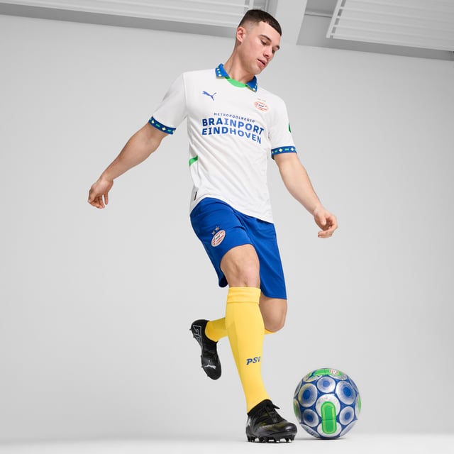 PRODUCT STORY: Many players have worn the PSV stripes with success. With this season's third kit we celebrate players from one country in particular: Brazil. Play like PSV's finest in this jersey featuring dryCELL tech and strategically placed mesh inserts to keep you cool and focused. FEATURES & BENEFITS: dryCELL: Performance technology designed to wick moisture from the body and keep you free of sweat during exercise; As part of the RE:FIBRE program, this garment is made of at least 95% recycled material from textile waste and other used materials. DETAILS: Regular fit; 170 gsm, Jacquard; Mesh inserts; Crew neck; Short sleeves with flat knit cuffs; Official team branding.  Our model is 183 cm tall and is wearing size M UK.