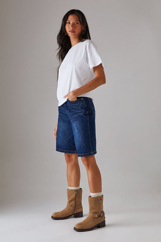 Faux suede chunky biker calf boots
        Mid-heel height between 5 and 6.5cm
        Decorative buckle and strap detailing
        Side zip closure for easy wear
        Sturdy block heel for comfort and stability
    
    Step out in style with these Faith Eostre faux suede chunky biker calf boots. The edgy design combines comfort and fashion, making them perfect for various casual outings. The mid-heel height offers a subtle lift without compromising on wearability, ideal for all-day adventures. Style these versatile boots with a flowy mini skirt and an oversized jumper for a chic autumn look, or pair them with skinny jeans and a leather jacket for a classic biker-inspired ensemble. These boots are your go-to choice for family gatherings, weekend brunches, or casual shopping trips. Their robust construction and timeless appeal ensure they'll be a staple in your wardrobe for seasons to come, effortlessly transitioning from day to night with their adaptable style.