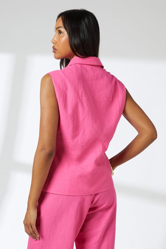 Sleeveless design with classic collar for a sophisticated silhouette
        Flattering peplum waist with D-ring belt detail for adjustable fit
        Crafted from breathable linen-cotton blend for comfort throughout the day
        Button-through front with clean finishing for effortless style
        Wide-leg trousers create a balanced, contemporary proportion
    
    This striking Principles co-ord brings together the best of casual refinement and warm-weather practicality. The sleeveless shirt features a smart collar and peplum detail that creates a feminine silhouette, whilst the D-ring belt allows for customised waist definition. Pair with the matching wide-leg trousers for a coordinated daytime look that works beautifully for garden parties or alfresco dining. For casual outings, style with white trainers and a woven tote, or dress up with neutral-toned sandals and delicate gold jewellery for lunch with friends. The natural linen-cotton blend offers breathability and a textured finish that's perfect for summer socialising. This versatile set can also be worn as separates - try the shirt with denim or the trousers with a simple camisole for extended wardrobe options.