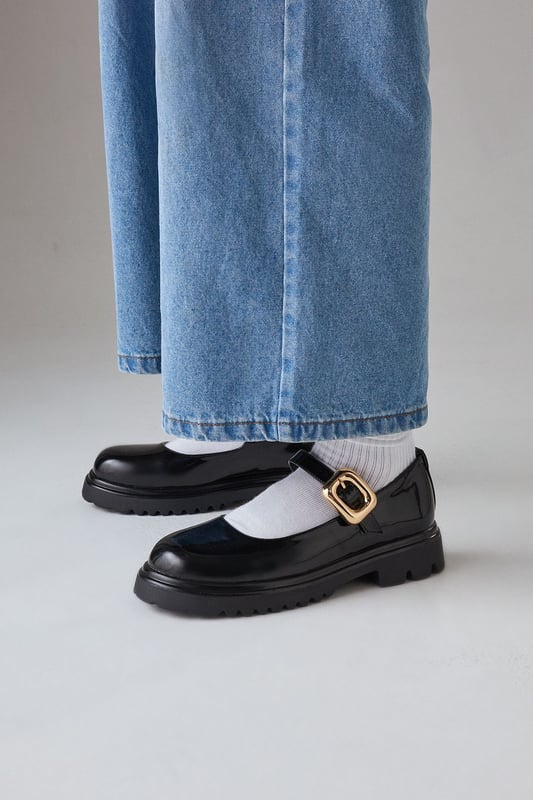 Chunky Mary Jane style with a large decorative buckle
        Faux leather upper for a sleek appearance
        Mid-heel height between 5 and 6.5cm for comfortable wear
        Thick, durable sole for added stability
        Versatile design suitable for various casual occasions
    
    Step out in style with these Faith Lysithia Mary Jane shoes, a perfect blend of classic charm and modern edge. The chunky silhouette and large buckle detail create a bold statement, while the faux leather finish adds a touch of sophistication. With a comfortable mid-heel height, these shoes are ideal for all-day wear, whether you're running errands or meeting friends for brunch. Style them with wide-leg jeans and an oversized blazer for a trendy daytime look, or pair them with a flowy midi dress for a more feminine ensemble. The versatile design makes these shoes a go-to choice for family gatherings, casual outings, or even relaxed office environments. Their durable construction ensures they'll be a long-lasting addition to your wardrobe, ready to complement a variety of casual looks throughout the seasons.