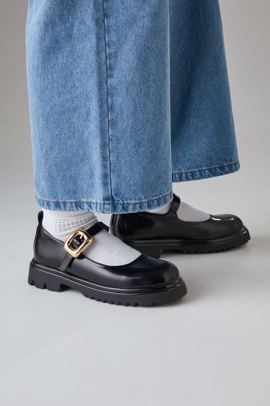 Chunky Mary Jane style with a large decorative buckle
        Faux leather upper for a sleek appearance
        Mid-heel height between 5 and 6.5cm for comfortable wear
        Thick, durable sole for added stability
        Versatile design suitable for various casual occasions
    
    Step out in style with these Faith Lysithia Mary Jane shoes, a perfect blend of classic charm and modern edge. The chunky silhouette and large buckle detail create a bold statement, while the faux leather finish adds a touch of sophistication. With a comfortable mid-heel height, these shoes are ideal for all-day wear, whether you're running errands or meeting friends for brunch. Style them with wide-leg jeans and an oversized blazer for a trendy daytime look, or pair them with a flowy midi dress for a more feminine ensemble. The versatile design makes these shoes a go-to choice for family gatherings, casual outings, or even relaxed office environments. Their durable construction ensures they'll be a long-lasting addition to your wardrobe, ready to complement a variety of casual looks throughout the seasons.