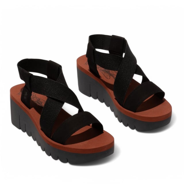 The YABI922FLY sandals from Fly London elevate your footwear collection with a sleek and modern design. Crafted with premium materials, these sandals feature an adjustable slingback and a sturdy wedge sole, offering both style and comfort. Whether you're dressing up for a casual day out or looking for a comfortable yet chic option for long hours, these sandals are a versatile choice that will keep you feeling confident all day long.

Key Features:

Premium Leather Upper: High-quality leather construction for long-lasting durability.
Microfiber Lining: Soft, abrasion-free lining for a smooth and comfortable fit.
EVA Footbed: Non-removable, cushioned footbed that provides excellent support and comfort.
Elastic Gussets: Flexible elastic panels offer a secure, customizable fit.
Wedge Sole: Stylish 6 cm wedge for added height and a trendy look.
Durable Rubber Outsole: Provides superior grip and traction for all-day wear.