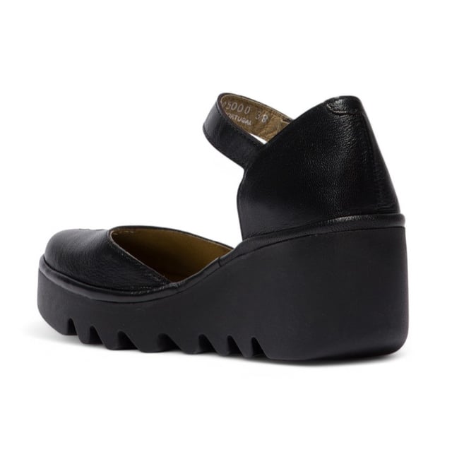 The BISO305FLY sandals from Fly London bring together timeless elegance and all-day comfort. Designed for effortless style, these sandals feature a high-quality leather upper, a comfortable leather-lined footbed, and a durable wedge sole. Whether you're walking through the city or relaxing on a sunny day, these sandals will elevate your look with their sophisticated design and reliable comfort.

Key Features:

Premium Leather Upper: High-quality, durable leather upper for a refined and elegant look.
Leather Lining: Soft leather lining provides a smooth, abrasion-free experience.
Leather Footbed: Non-removable footbed lined with leather for superior cushioning and support.
Easy Closure: Easy-to-use velcro strap ensures a secure, customized fit for added stability.
Wedge Sole: Stylish 6.5 cm wedge for enhanced height and a fashionable touch.
TR Rubber Outsole: Durable rubber sole designed for exceptional grip and traction.
Heel Height: 6.5 cm wedge heel adds the perfect amount of lift while keeping comfort in mind.
