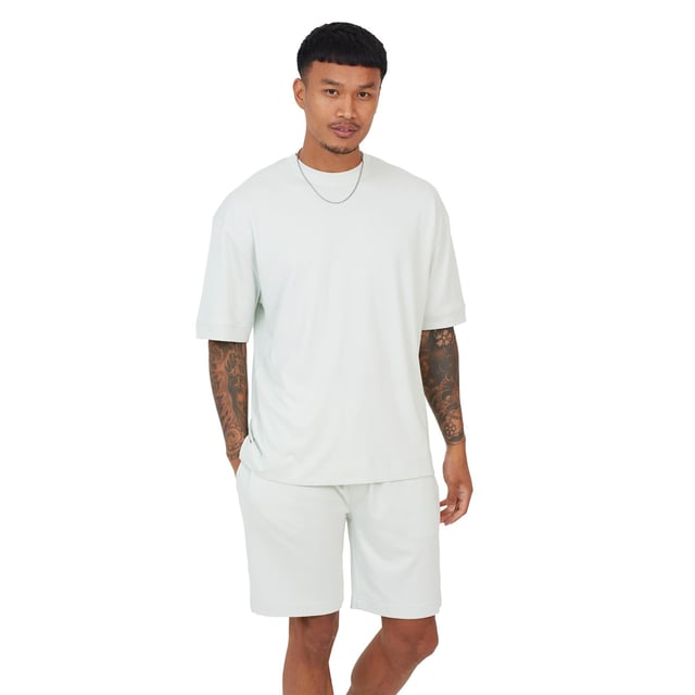 The Brave Soul Men's Short Sleeve T-Shirt & Short Set is the ideal comfort wear to don on placid summer happenings. It's really easy to wear and tremendously chic on hot days. Soft and breathable, the short-sleeve T-shirt and matching shorts offer a polished look for strolling in the warm summer air. Whether you are lounging at home, strolling, or on a sunny getaway, this ensemble will guarantee comfort all day long while taking care of your laid-back style. Lightweight fabric with ease of fit makes it comfy to wear and move around in.