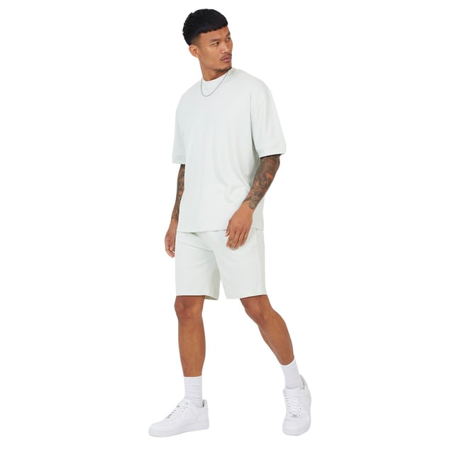 The Brave Soul Men's Short Sleeve T-Shirt & Short Set is the ideal comfort wear to don on placid summer happenings. It's really easy to wear and tremendously chic on hot days. Soft and breathable, the short-sleeve T-shirt and matching shorts offer a polished look for strolling in the warm summer air. Whether you are lounging at home, strolling, or on a sunny getaway, this ensemble will guarantee comfort all day long while taking care of your laid-back style. Lightweight fabric with ease of fit makes it comfy to wear and move around in.