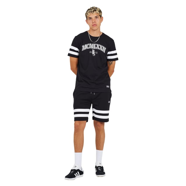 Update your casual wardrobe with this t-shirt and shorts set from Brave Soul. The crew neck t-shirt features cut and sew panel detail on the chest and sleeves and embroidery detail on the chest, and the matching shorts feature two side pockets and embroidery detail on the leg. This set boasts style and comfort for the perfect everyday outfit. Model wears UK size M.