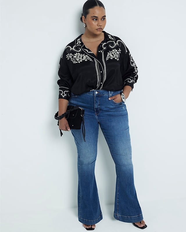Plus collection, Mid rise, Flare design, Denim fabric, Belt loops, Classic 5 pockets, Button and zip fastening, Cotton for this product has been more responsibly sourced