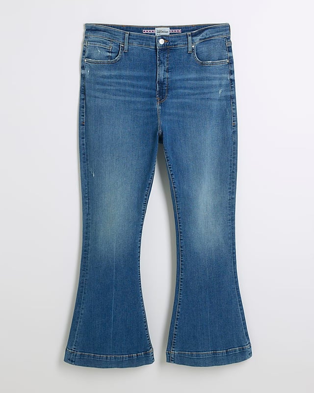 Plus collection, Mid rise, Flare design, Denim fabric, Belt loops, Classic 5 pockets, Button and zip fastening, Cotton for this product has been more responsibly sourced