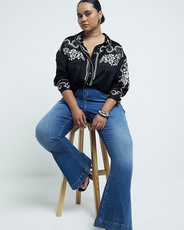 Plus collection, Mid rise, Flare design, Denim fabric, Belt loops, Classic 5 pockets, Button and zip fastening, Cotton for this product has been more responsibly sourced