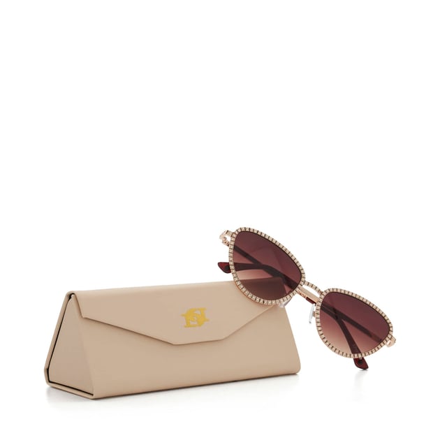 Let your eyes do the talking and slip on Glinting, a pair of diamante embellished sunglasses that add just the right amount of sparkle to your look.