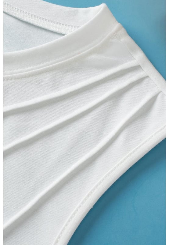 Our styles are designed with a trendy fitted look in mind following an international size standard. For the best fit we suggest choosing one size up from your usual. Be sure to check our sizing chart to find your perfect match!
  Stylish pleated design adds a trendy touch
  Soft and breathable fabric for all
  day comfort
  Versatile crew neck for a classic look
  Perfect for layering or wearing alone
  Flattering fit with a chic casual silhouette
Material: 62% Polyester 32% Cotton 6% Elastane