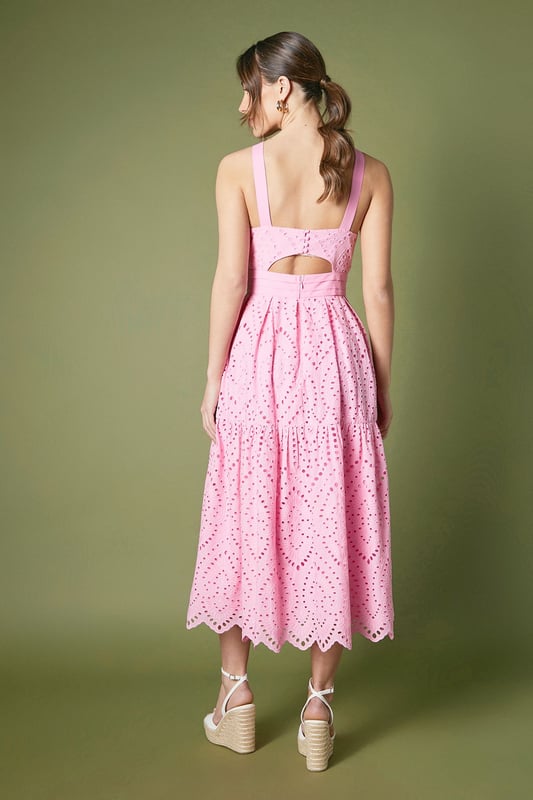 Striking disc sequin embellishment creates a dazzling light-catching effect
        Elegant fitted silhouette with a flattering midi length
        Statement floral corsage detail at the neckline adds sophisticated dimension
        Delicate scalloped hem with intricate eyelet pattern throughout
        Stylish cut-out back detail with secure fastening for a contemporary twist
    
    Make an unforgettable entrance at your next special occasion in this exquisite Coast midi dress. The fitted bodice gracefully highlights your silhouette while the eye-catching disc sequins catch and reflect light with every movement. Perfect for weddings or race day events, this dress combines timeless elegance with contemporary design through its distinctive floral corsage and modern cut-out back detail. Style with neutral platform sandals and a structured clutch as shown for daytime sophistication, or transition to evening events with metallic strappy heels and statement earrings. The scalloped eyelet pattern adds textural interest and a feminine touch that ensures you'll stand out for all the right reasons. This versatile piece works beautifully for garden parties, formal receptions or any event where you wish to convey refined glamour.