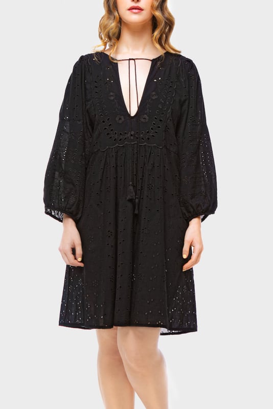 Effortlessly chic with a modern romantic twist, the ELLE Jane Dress in Black is your go-to for versatile elegance. Crafted from lightweight cotton with delicate eyelet embroidery, this mini dress features voluminous balloon sleeves, a flattering deep V-neckline, and a gently gathered waist for a floaty, feminine silhouette.

Whether you're dressing it up with heels for a night out or pairing it with espadrilles for a daytime stroll, the Jane Dress transitions seamlessly from season to season. It’s the little black dress—with a breezy, contemporary edge.

Key Features:

All-over eyelet embroidery

Lightweight and breathable fabric

Deep V-neckline

Long balloon sleeves with elastic cuffs

Above-the-knee hemline

Relaxed fit with a cinched waist

Main Fabric 100% Cotton

Embroidery 100% Polyester