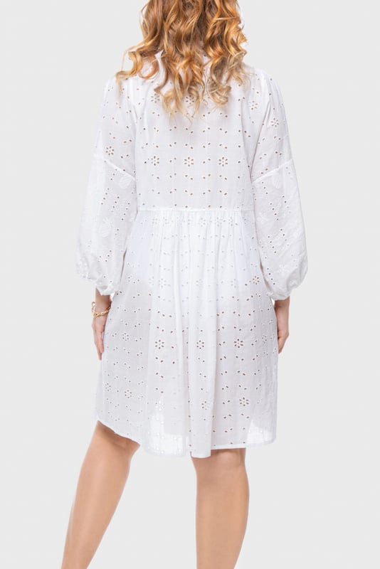 Effortlessly chic with a modern romantic twist, the ELLE Jane Dress in Black is your go-to for versatile elegance. Crafted from lightweight cotton with delicate eyelet embroidery, this mini dress features voluminous balloon sleeves, a flattering deep V-neckline, and a gently gathered waist for a floaty, feminine silhouette.

Whether you're dressing it up with heels for a night out or pairing it with espadrilles for a daytime stroll, the Jane Dress transitions seamlessly from season to season. It’s the little black dress—with a breezy, contemporary edge.

Key Features:

All-over eyelet embroidery

Lightweight and breathable fabric

Deep V-neckline

Long balloon sleeves with elastic cuffs

Above-the-knee hemline

Relaxed fit with a cinched waist

Main Fabric 100% Cotton

Embroidery 100% Polyester