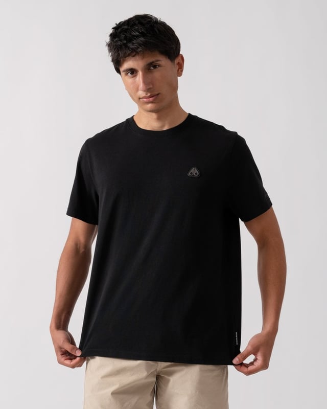 This t-shirt keeps it minimal with tiny branding at the front, offering a clean and understated look.


Regular Fit
Rib Knit Collar
Triangle Patch with Gun Metal Logo
Moose Knuckles Label on Side Seam



100% Pima Cotton Jersey
M15MT777