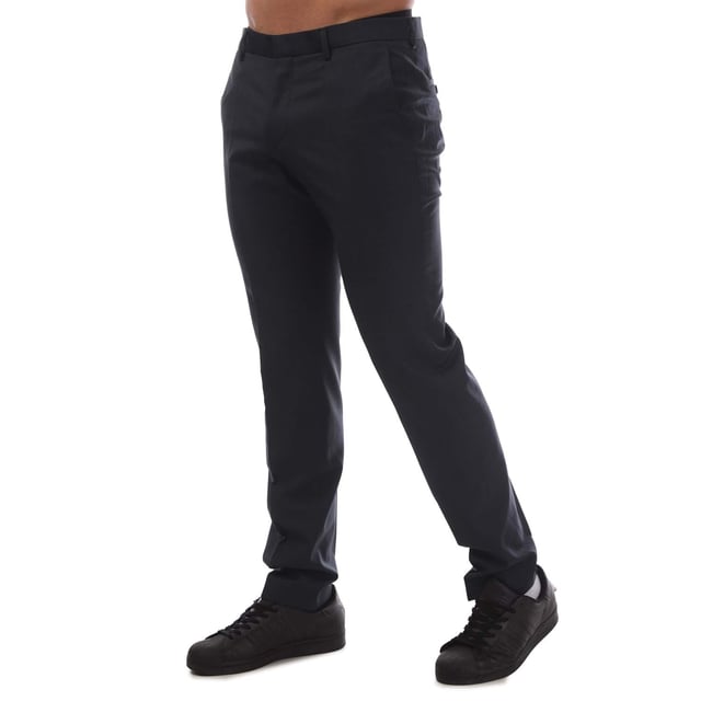 Men's Hugo Getlin Trousers. Hook eye and zip fastening.- Side pockets.- Back pockets.- Belt loops.- Pleat front.- Slim fit. Material: 74% Virgin Wool, 17% Polyester, 9% Polyamide. Ref: 50400708404.
