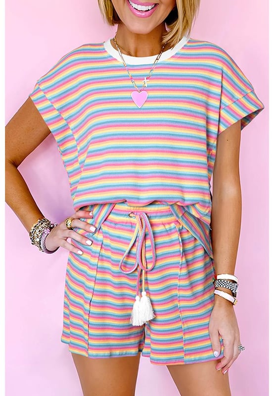 Our styles are designed with a trendy fitted look in mind following an international size standard. For the best fit we suggest choosing one size up from your usual. Be sure to check our sizing chart to find your perfect match!
  Classic shorts set for summer with a stylish striped print
  Crew neck t
  shirt with a relaxed fit
  Shorts with a tasseled drawstring
  Breathable fabric for all
  day comfort
  Versatile set perfect for casual outings or lounging at home
  Effortlessly chic for a relaxed look
Material: 95% Cotton 5% Elastane