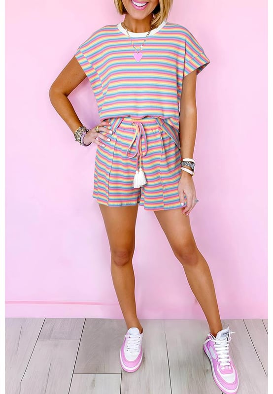 Our styles are designed with a trendy fitted look in mind following an international size standard. For the best fit we suggest choosing one size up from your usual. Be sure to check our sizing chart to find your perfect match!
  Classic shorts set for summer with a stylish striped print
  Crew neck t
  shirt with a relaxed fit
  Shorts with a tasseled drawstring
  Breathable fabric for all
  day comfort
  Versatile set perfect for casual outings or lounging at home
  Effortlessly chic for a relaxed look
Material: 95% Cotton 5% Elastane