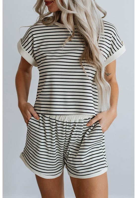 Our styles are designed with a trendy fitted look in mind following an international size standard. For the best fit we suggest choosing one size up from your usual. Be sure to check our sizing chart to find your perfect match!
  Striped tee and shorts set for a casual and fashionable look
  Relaxed fit and knit texture for comfort and versatility
  Classic black and white stripes for a timeless style
  Ideal for lounging exercise beach outings and more
  High elasticity for a comfortable fit
Material: 50% Cotton 47% Polyester 3% Elastane