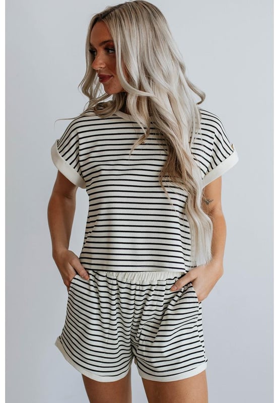 Our styles are designed with a trendy fitted look in mind following an international size standard. For the best fit we suggest choosing one size up from your usual. Be sure to check our sizing chart to find your perfect match!
  Striped tee and shorts set for a casual and fashionable look
  Relaxed fit and knit texture for comfort and versatility
  Classic black and white stripes for a timeless style
  Ideal for lounging exercise beach outings and more
  High elasticity for a comfortable fit
Material: 50% Cotton 47% Polyester 3% Elastane