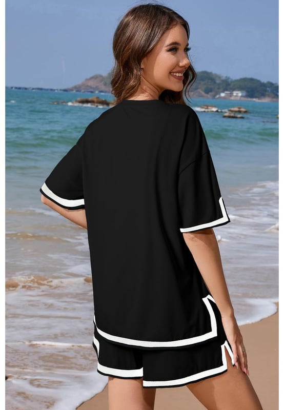 Our styles are designed with a trendy fitted look in mind following an international size standard. For the best fit we suggest choosing one size up from your usual. Be sure to check our sizing chart to find your perfect match!
  Stylish contrast trim design creates a modern look
  Includes a classic tee and matching shorts
  Soft breathable fabric for all
  day comfort
  Relaxed fit for ease of movement
  Versatile set perfect for lounging or casual outings
  Available in various sizes and colors
Material: 95% Polyester 5% Elastane