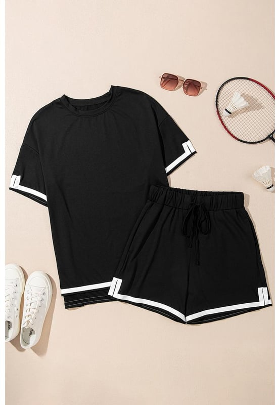 Our styles are designed with a trendy fitted look in mind following an international size standard. For the best fit we suggest choosing one size up from your usual. Be sure to check our sizing chart to find your perfect match!
  Stylish contrast trim design creates a modern look
  Includes a classic tee and matching shorts
  Soft breathable fabric for all
  day comfort
  Relaxed fit for ease of movement
  Versatile set perfect for lounging or casual outings
  Available in various sizes and colors
Material: 95% Polyester 5% Elastane