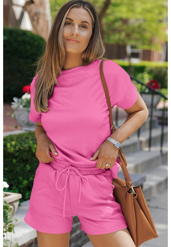 Our styles are designed with a trendy fitted look in mind following an international size standard. For the best fit we suggest choosing one size up from your usual. Be sure to check our sizing chart to find your perfect match!
  Two
  piece set suitable for warmer weather or casual occasions
  Made from a solid textured fabric
  Includes a short sleeve top and drawstring shorts in the same color
  Comfortable for activities such as lounging or running errands
Material: 95% Polyester 5% Elastane