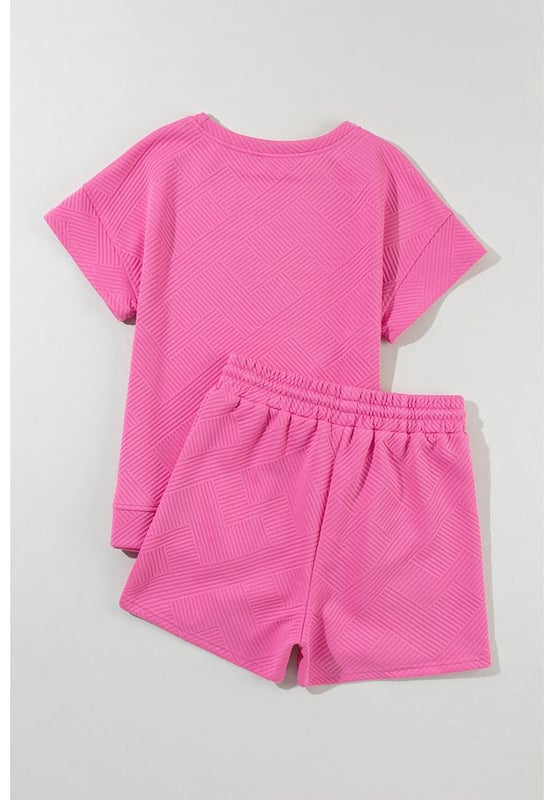 Our styles are designed with a trendy fitted look in mind following an international size standard. For the best fit we suggest choosing one size up from your usual. Be sure to check our sizing chart to find your perfect match!
  Two
  piece set suitable for warmer weather or casual occasions
  Made from a solid textured fabric
  Includes a short sleeve top and drawstring shorts in the same color
  Comfortable for activities such as lounging or running errands
Material: 95% Polyester 5% Elastane