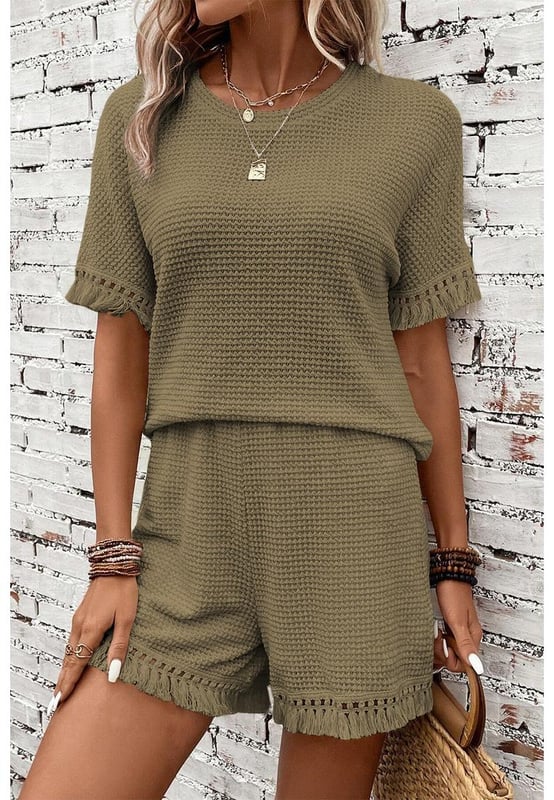 Our styles are designed with a trendy fitted look in mind following an international size standard. For the best fit we suggest choosing one size up from your usual. Be sure to check our sizing chart to find your perfect match!
  Laurel Green Fringe Trim Textured Short Two Piece Set
  Chic boho vibe with fringe trim
  Unique and fashionable textured fabric
  Includes a tee and shorts
  Stylish and comfortable
  Ideal for daily and casual occasions
Material: 67% Polyester 30% Viscose 3% Elastane