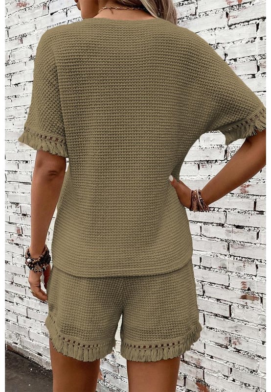 Our styles are designed with a trendy fitted look in mind following an international size standard. For the best fit we suggest choosing one size up from your usual. Be sure to check our sizing chart to find your perfect match!
  Laurel Green Fringe Trim Textured Short Two Piece Set
  Chic boho vibe with fringe trim
  Unique and fashionable textured fabric
  Includes a tee and shorts
  Stylish and comfortable
  Ideal for daily and casual occasions
Material: 67% Polyester 30% Viscose 3% Elastane