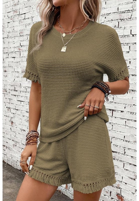 Our styles are designed with a trendy fitted look in mind following an international size standard. For the best fit we suggest choosing one size up from your usual. Be sure to check our sizing chart to find your perfect match!
  Laurel Green Fringe Trim Textured Short Two Piece Set
  Chic boho vibe with fringe trim
  Unique and fashionable textured fabric
  Includes a tee and shorts
  Stylish and comfortable
  Ideal for daily and casual occasions
Material: 67% Polyester 30% Viscose 3% Elastane